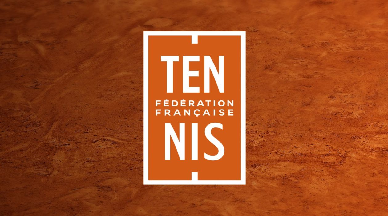French Tennis Federation logo on clay court