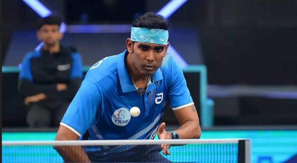 Close-up of an Indian table tennis player serving