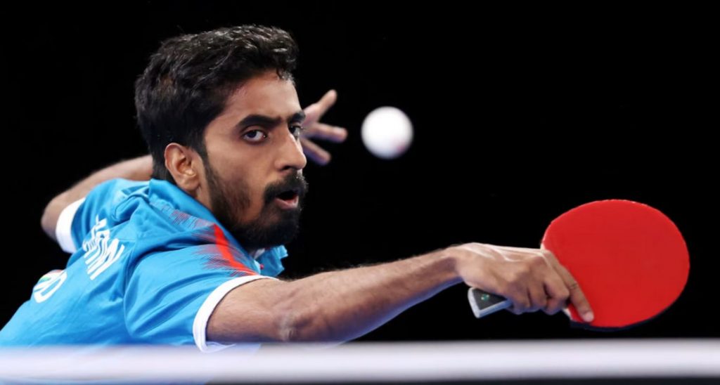 Two Indian table tennis players in a heated match